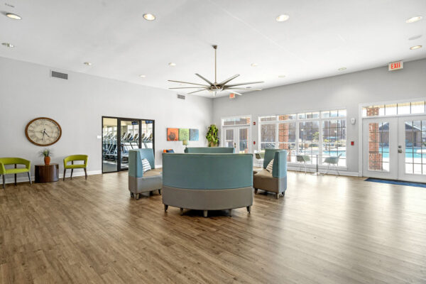 Resident clubhouse lounge with pool access at The Overlook student apartments near SFA Nacogdoches