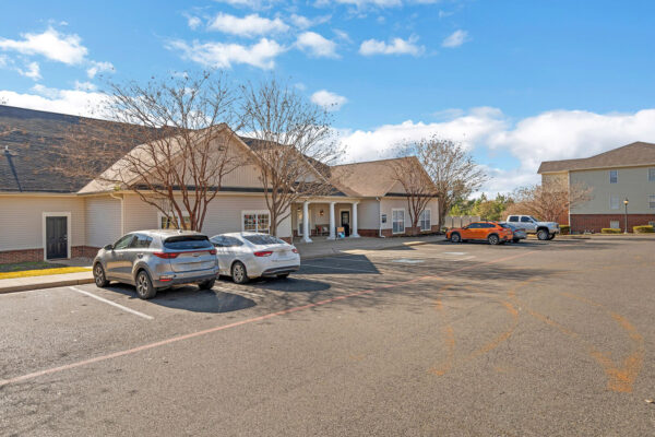 Leasing office exterior with parking at The Overlook student apartments in Nacogdoches TX