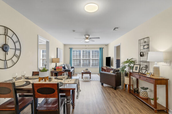 Furnished open-plan living and dining room in a student apartment at The Overlook Nacogdoches TX