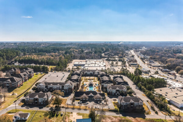 Aerial view of The Overlook student apartment community with SFA campus visible in the background Nacogdoches TX